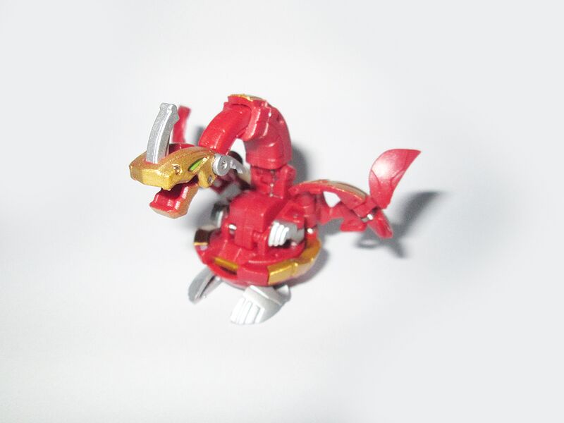 File:KeithStrife Pyrus IronDragonoid BakuGold.JPG